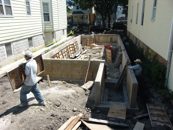 New concrete foundation with 4 foot walls located in Chicago, IL.