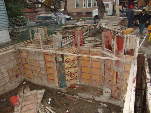 Foundation wall with bay window bump out in front, located in Chicago, IL.