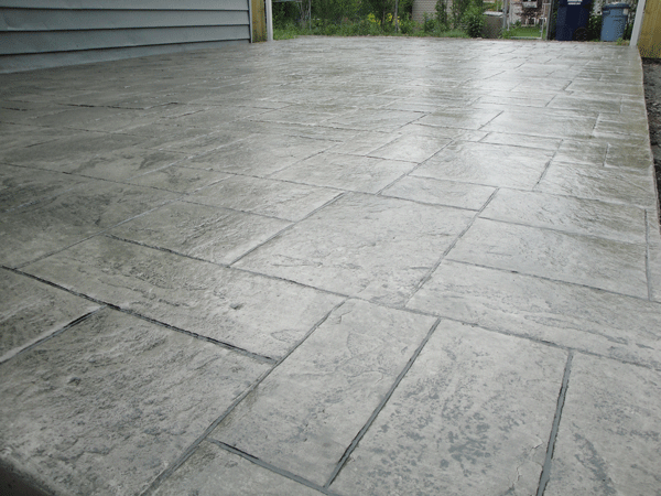 After picture of same stamped concrete driveway